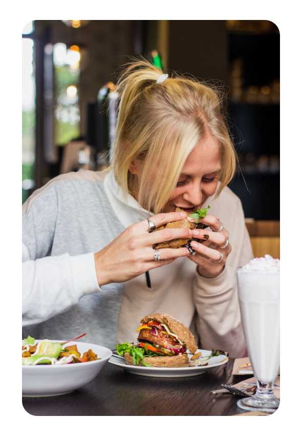 girl eating a burger