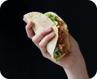 hand holding a kebab
